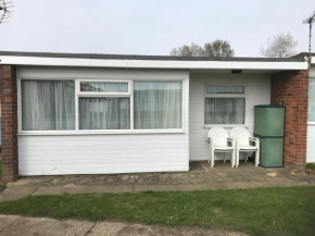 Captivating 2-Bed Chalet - Pool & Pet-Friendly